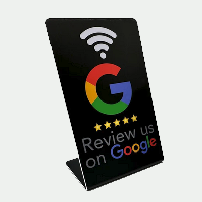 Black countertop stand for Google reviews with NFC, stars, and Review us on Google branding